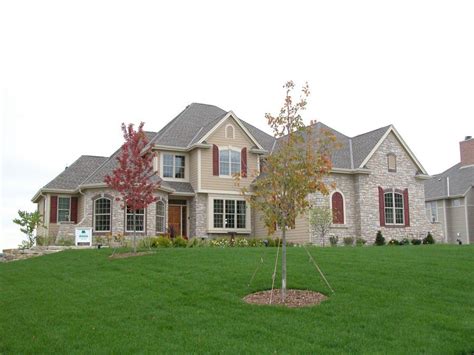 Award winning joseph douglas homes interior styling 9′ first floor on all 2 story plans and 10' on all ranch plans stone or brick fireplace surround to mantel height moen® eva pullout kitchen faucet with stainless steel finish Milwaukee Home Builders | Joseph Douglas Homes | WI home ...