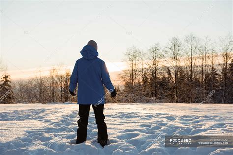 Man Standing On Snow Covered Landscape — Outdoors Jacket Stock Photo