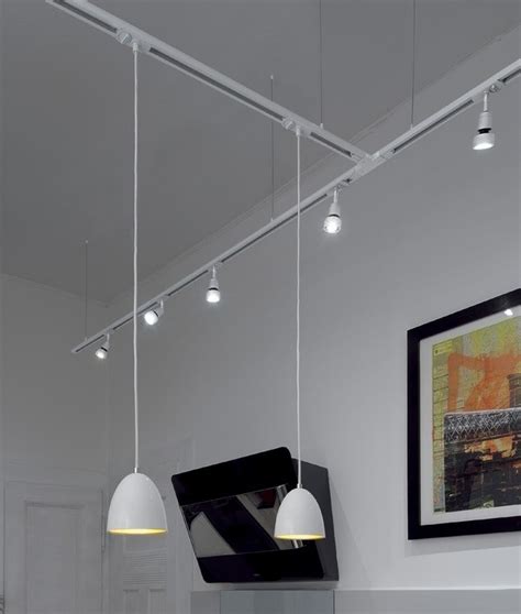 Track lighting is great idea if you want to replace existing ceiling fittings without having to rewire the house. Ceiling suspension for single circuit track perfect for ...