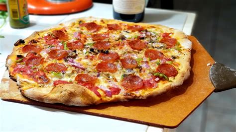 Homemade Pepperoni Mushroom Bell Pepper And Red Onion Pizza With
