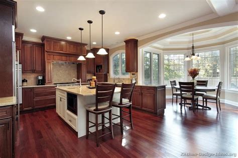 For an overall darker, more traditional kitchen style, dark stained wood floors create a cohesive look. Pictures of Kitchens - Traditional - Two-Tone Kitchen ...