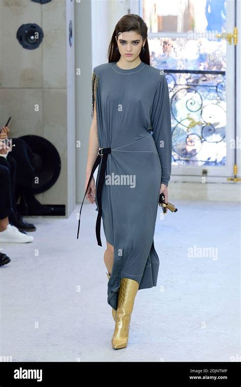 Amodel Walks The Runway During The Louis Vuitton Show As A Part Of