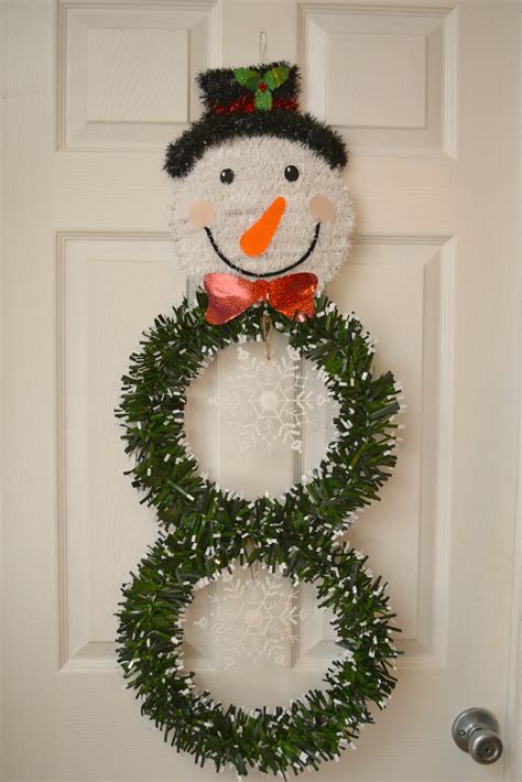 Be sure to click through to the full 1. DIY Dollar Store Snowman Wreath - Holiday Tutorial