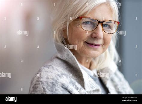 Portrait Of Senior Woman Smiling Stock Photo Alamy