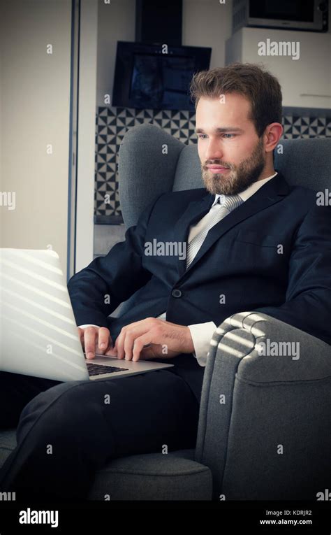 Young Business Man Working From Home With Laptop Home Computer