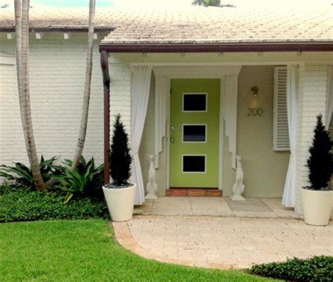 The architecture uses earthy paint colors and natural materials like wood, leather, and stone to bring the home to life. MASTER CLASS: EXTERIOR HOUSE COLORS | Exterior house ...