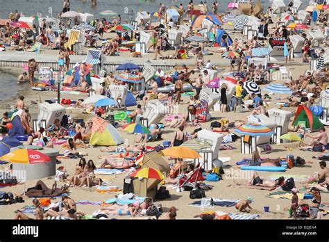 Berlin Germany People Bask In The Wannsee Beach Stock Photo Alamy