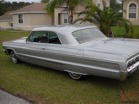 I have an orginal 3 speed on the column 283 motor ss marroon with a beige top. 1964 CHEVY IMPALA SS 327/300HP, AUTO, ALL ORG.