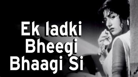 Ek Ladki Bheegi Bhaagi Si Lyrics In Hindi And English Kishore Kumar Chalti Ka Naam Gaadi