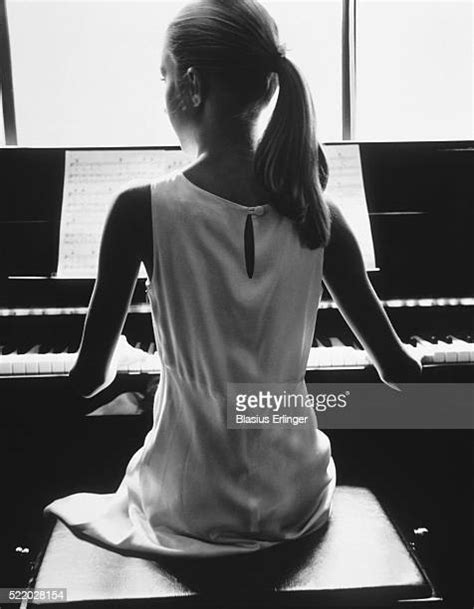 Girl At Piano Photos And Premium High Res Pictures Getty Images