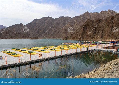 Beautiful Deep Green Hatta Lake Between Hajar Mountains With Many