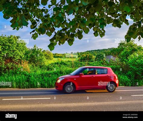 Red Car Leafy Hi Res Stock Photography And Images Alamy