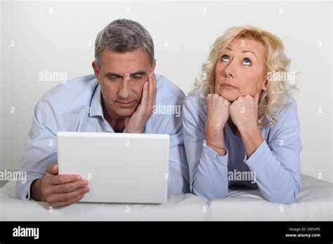 Man And Wife Bored Stock Photo Alamy