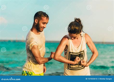 Happy Free Couple Cheering On Perfect Beach Travel Holiday Stock Image