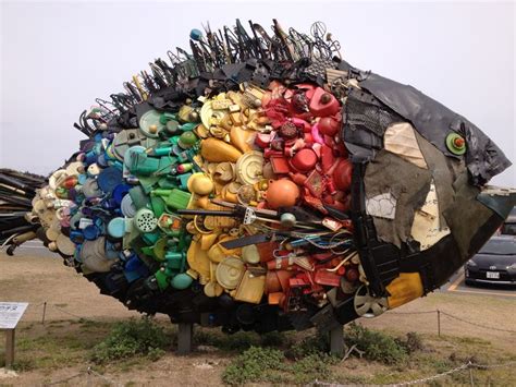 A Fish Sculpture Made Entirely Out Of Recycled Household Material