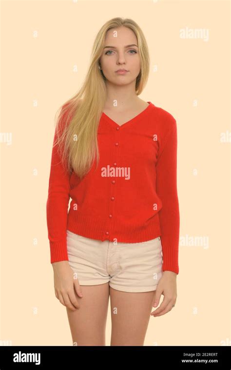 Studio Shot Of Young Beautiful Teenage Girl Standing Stock Photo Alamy