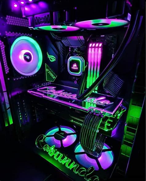 The Inside Of A Computer Case With Neon Lights And Speakers On Its Sides