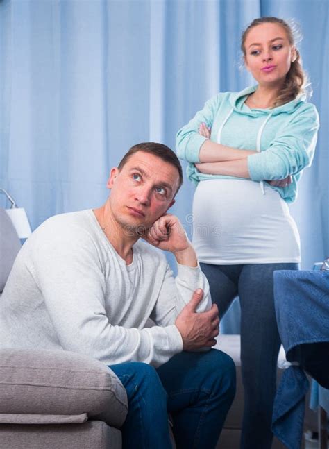 Husband And Pregnant Wife Arguing At Home Stock Image Image Of