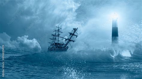 Old Sailing Ship At The Stormy Sea With Lighthouse On The Background