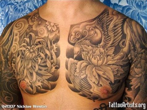 Lotus And Phoenix Chest Tattoo Chest Tattoo Tattoo Designs Men