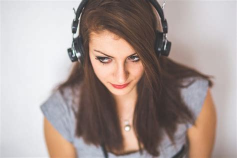 Selective Focus Photo Of Woman Wearing Headphones Free Image Peakpx