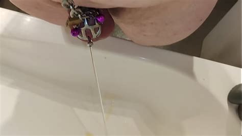 Submissive Pissing Thru Catheter Being Locked In Small Chastity Cage Xxx Mobile Porno Videos