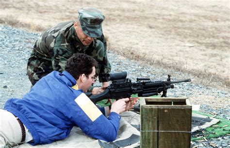 A Marine Sergeant Explains Th Operation Of An M 249 Squad Automatic