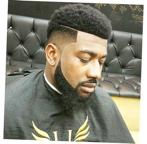 The hairstyle is cut in such a way that all the hairs of the top are cut in a pattern of the circle and the hairs from the sides are cut very short. Black Men Hairstyles 2016 Recommended - Ellecrafts
