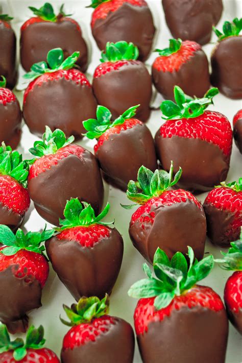 Chocolate, strawberries, and 4 minutes is all you need! Chocolate-Dipped Strawberries - Weaver Street Market