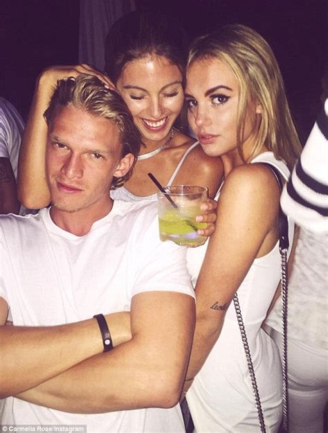 Joyful young couple lying on bed inside home cuddling and being affectionate in the morning. Cody Simpson's rumoured ex Carmella Rose flaunts her ...