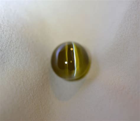 25 04 carat natural apple green cat s eye chrysoberyl gemstone ceylon elizabeth jewellers