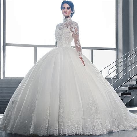 beautiful white ball gown wedding dress lace sheer neckline long sleeve tulle wedding dress
