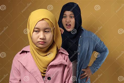 Muslim Mother Having Bad Time With Her Daugther Mom Reprimands Her Teenage Girl Stock Image