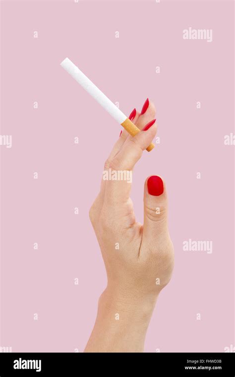 Female Hand Holding Cigarette Stock Photo Alamy