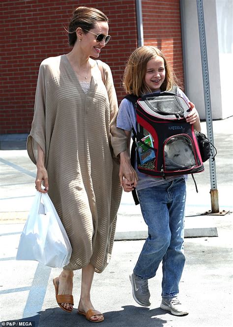 He just held me and said he loved me, and i know he's. Angelina Jolie covers up in a grey baggy dress as daughter ...