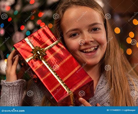 Happy Girl At Christmas Time With A Present Stock Image Image Of Girl