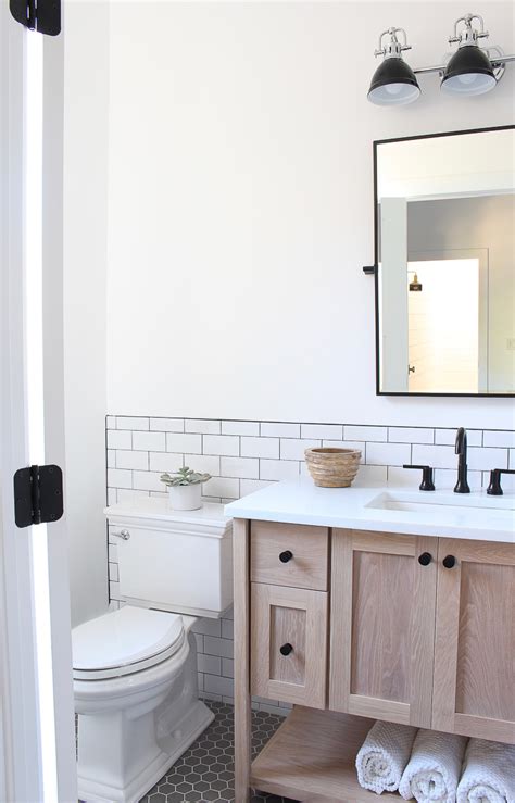 Wide grout lines also add a distinguishing accent to the tile application, as does a specialty glaze or color. A Classic White Subway Tile Bathroom Designed By Our ...