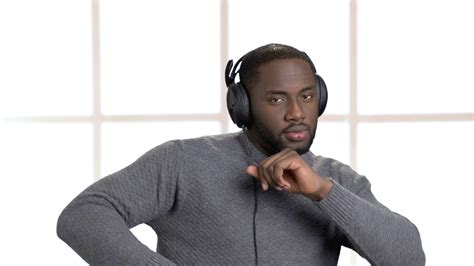 Handsome Man In Headphones Is Listening To Music Cheerful Afro