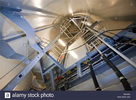 A wind turbine installation consists of the necessary systems needed to capture the wind's energy, point the turbine into the wind, convert mechanical rotation into electrical power. The inside of a Siemens offshore wind turbine tower ...