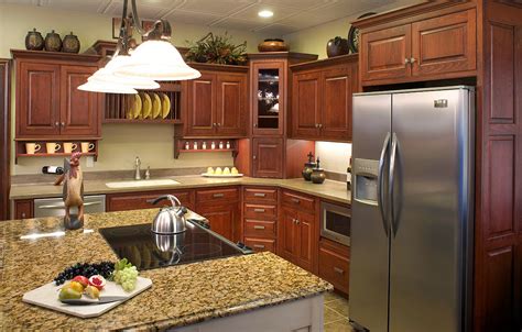 The crisp white cabinets and stainless steel appliances prove that retro style can be achieved without abandoning modern conveniences. Modern Kitchen Designs With Brown Wood Cabinet - Decor Units