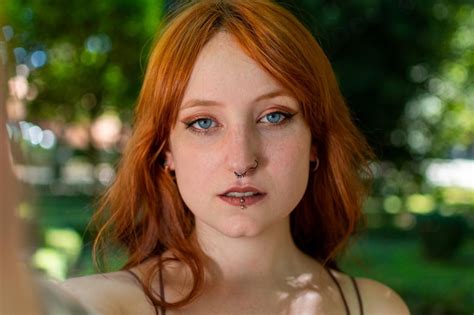 Premium Photo Cute Happy Redhead Young Woman Taking A Selfie Outdoors At Park