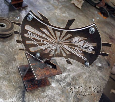 Refinerii Studios Custom Industrial Steel Trophies With I Beam And Cable