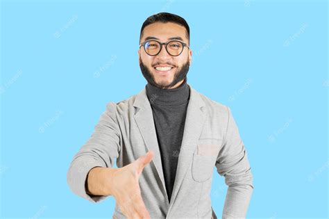 Premium Photo Handsome Asian Man With Glasses And Beard Wearing A Businessman39s Jacket