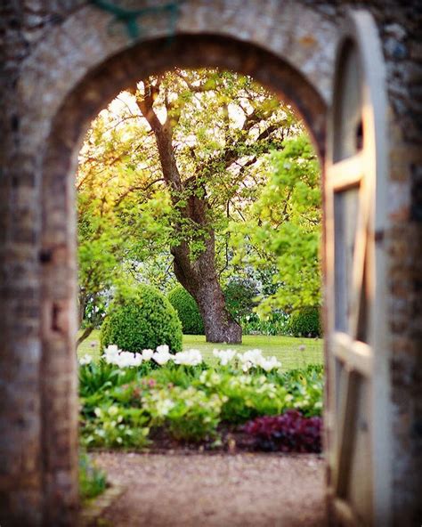 View Through Door To Walledgarden At Wretham Lodge Gardeninspiration