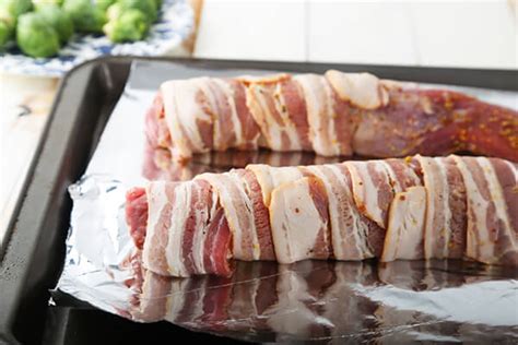 Submerge the tenderloin in the brine, cover the bowl with plastic wrap, and refrigerate for at least 8 hours, preferably overnight. Pork Tenderloin Wrapped On Tin Foil In Oven : Cooking Foods In Foil Wrap | Oven baked pork ribs ...