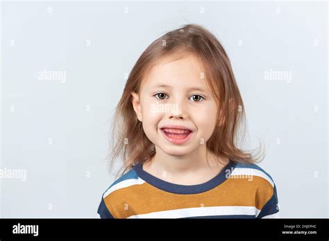 Six Year Old Caucasian Girl Shows Myofunctional Trainer Dental Tariner