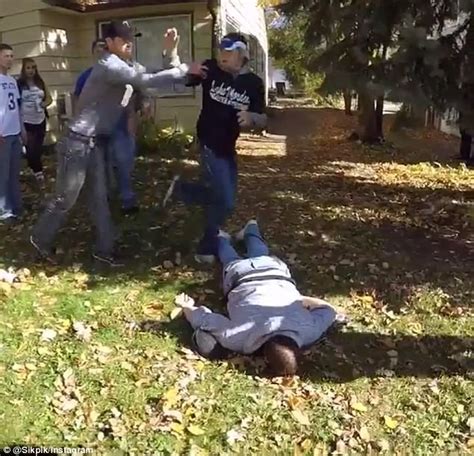 shocking moment a man knocks out two men in a brawl daily mail online