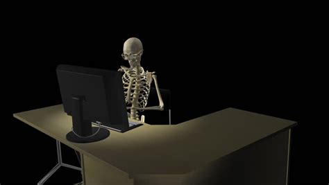 Skeleton Working On Computer Front Side Long Royalty Free Video