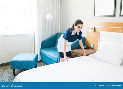 Latin Maid Making Bed In Hotel Room Stock Image Image Of Room Smiling