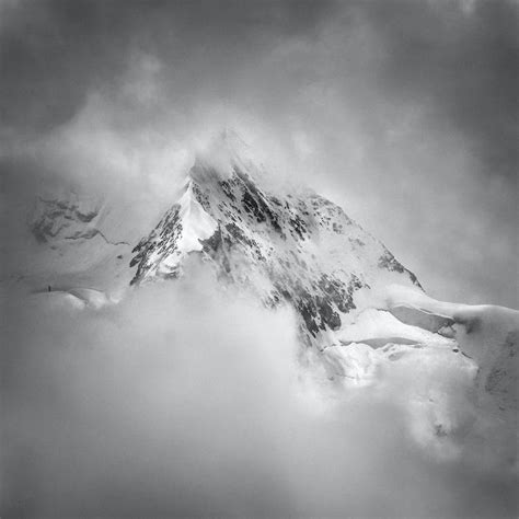 Grayscale Photo Of Mountain Covered With Snow · Free Stock Photo